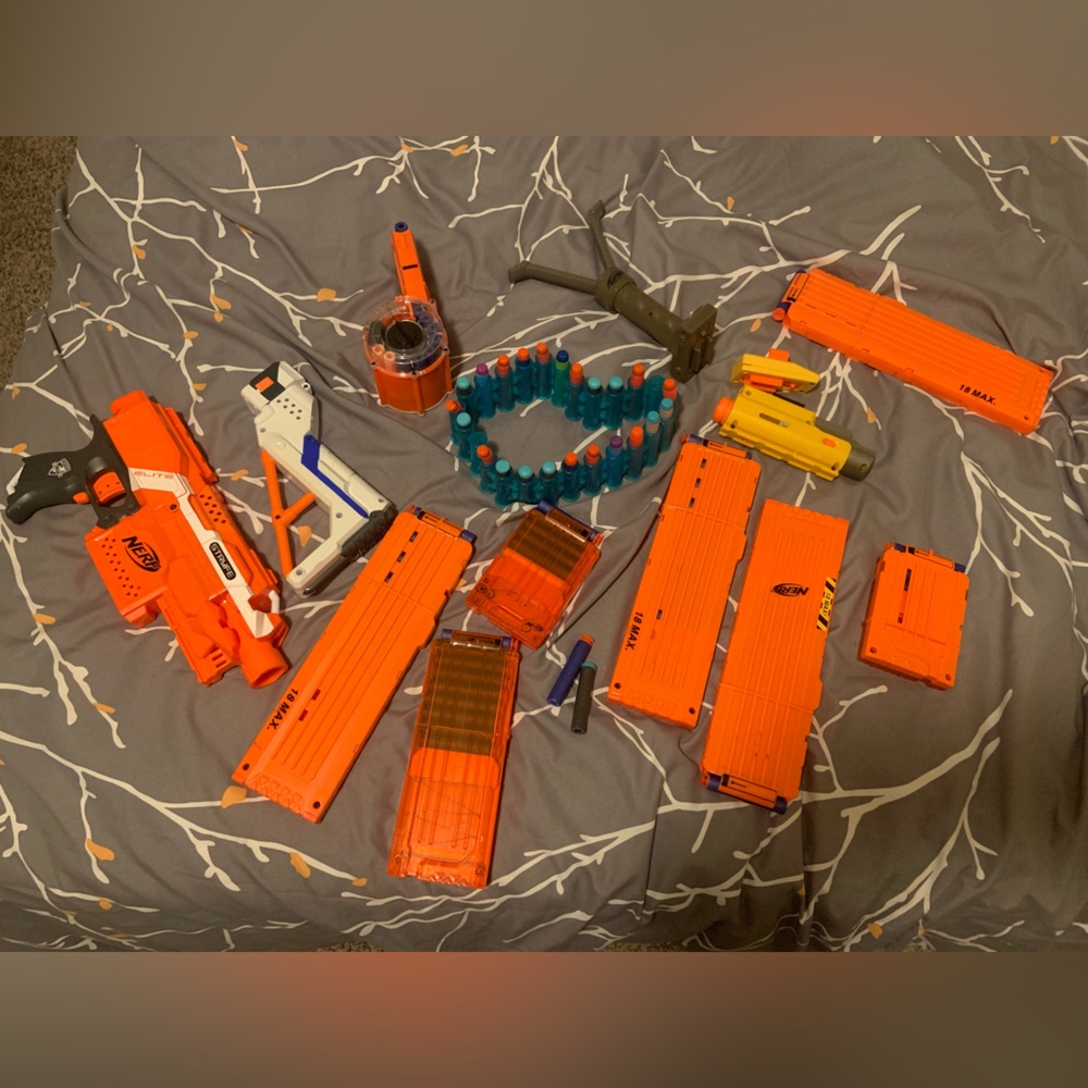 Nerf Gun Collection with darts clips bandolier attachments and a gun